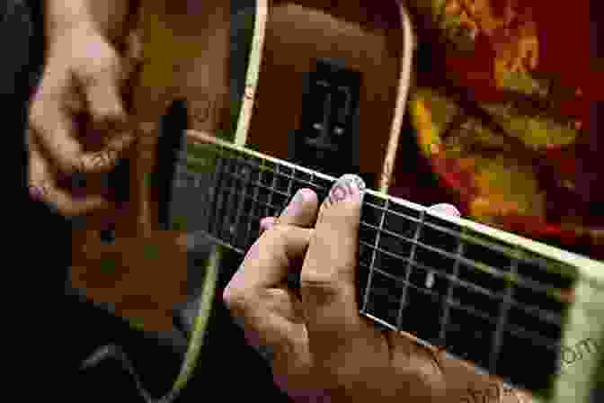 A Close Up Of A Guitarist Playing A Bluegrass Tune On A Guitar School Of Bluegrass Guitar Bluegrass Classics