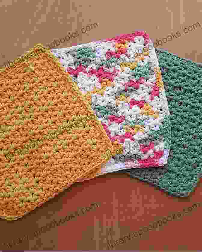 A Vibrant Crocheted Dishcloth Featuring A Granny Square Pattern In Shades Of Blue And Green. Crocheting Dishcloths Book: Dishcloth Patterns And Instructions For Beginners