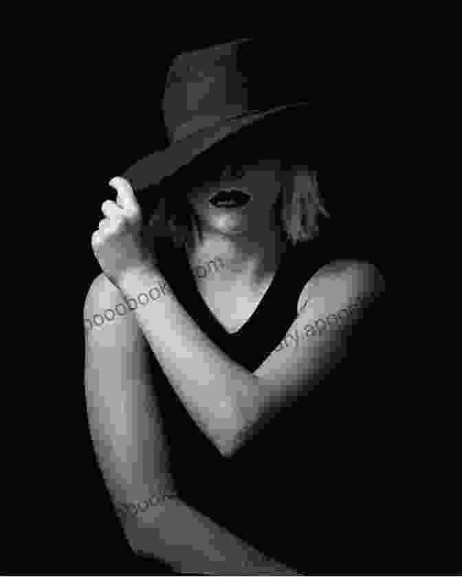 A Woman Standing In The Shadows, Her Face Obscured By A Hat, Looking Determined And Ready For Action Big Trouble Marisela Norte