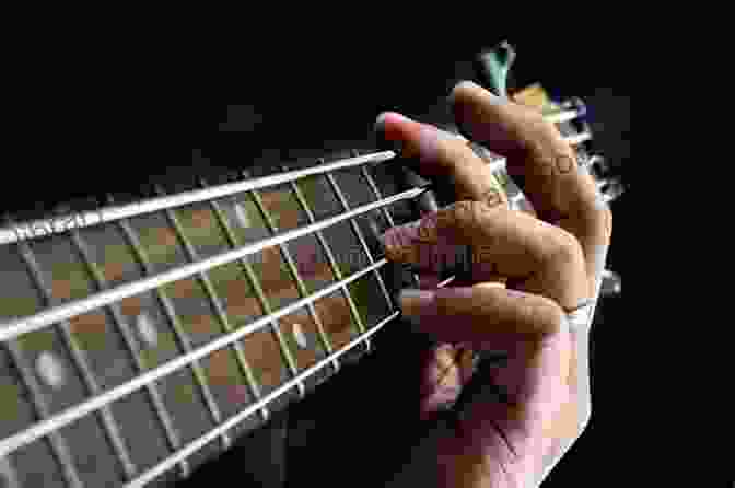 Close Up Of A Guitarist's Hands Playing Blues Guitar Blues You Can Use (Music Instruction)