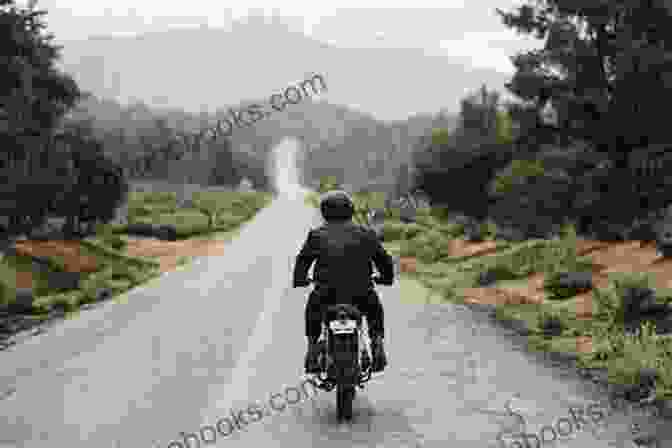 Motorcyclist Riding On An Open Road, Experiencing The Freedom And Exhilaration Of The Open Road The Official DVSA Guide To Learning To Ride