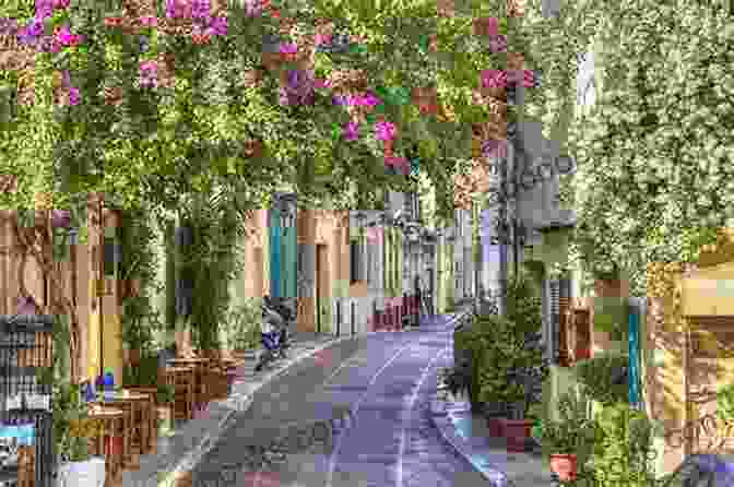 Narrow Streets And Whitewashed Houses Of The Plaka Neighborhood, With The Acropolis Visible In The Background. Athens John Gill